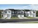New townhome exteriors feature varied neutral siding, black roof and a one car garage at 170 Parker Ln, Mebane, NC 27302
