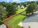 Aerial view of home with fenced backyard at 1728 E Honey Springs Ave, Fuquay Varina, NC 27526