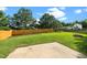 Home featuring a large backyard, privacy fence and a concrete patio at 1728 E Honey Springs Ave, Fuquay Varina, NC 27526