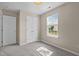 Bedroom with natural light and closet with double doors at 1728 E Honey Springs Ave, Fuquay Varina, NC 27526