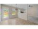 Bright dining room with stylish light fixture and view of the backyard at 1728 E Honey Springs Ave, Fuquay Varina, NC 27526