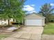 Charming home with a two-car garage, inviting curb appeal, and beautiful landscaping at 1728 E Honey Springs Ave, Fuquay Varina, NC 27526