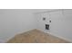 Bright laundry room with tile flooring and hookups at 1728 E Honey Springs Ave, Fuquay Varina, NC 27526