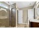 Bathroom with a glass-enclosed shower and a vanity with marble countertops at 18 Gwendolyn Cir, Durham, NC 27703