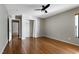 Bedroom featuring hardwood floors, ceiling fan, and closet at 18 Gwendolyn Cir, Durham, NC 27703