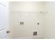 Laundry room with connections for a washer and dryer at 18 Gwendolyn Cir, Durham, NC 27703
