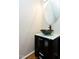 Stylish powder room features a unique vessel sink and modern vanity at 18 Gwendolyn Cir, Durham, NC 27703