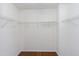 Bright walk-in closet with ample wire shelving, ideal for maximizing storage space at 18 Gwendolyn Cir, Durham, NC 27703