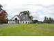 Community clubhouse with putting green, golf carts, and beautiful landscaping at 2006 Kapalua Way # 190, Durham, NC 27703