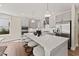 Modern kitchen featuring a spacious island with seating, stainless steel appliances, and ample cabinet space at 2006 Kapalua Way # 190, Durham, NC 27703