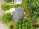 An aerial view of the home showing the roof and surrounding green landscape at 205 Town Creek Dr, Cary, NC 27519