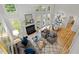Bright living room with fireplace, vaulted ceilings, multiple windows, and hardwood floors at 205 Town Creek Dr, Cary, NC 27519