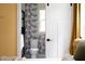 Bathroom with unique wallpaper design and a sliding barn door in a modern style at 212 E Rockway St, Durham, NC 27704