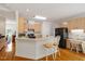 Well-equipped kitchen with island seating and stainless steel appliances at 216 Lewey Brook Dr, Cary, NC 27519