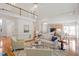 Spacious living room with views of kitchen and upstairs loft at 216 Lewey Brook Dr, Cary, NC 27519