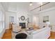 Inviting living room featuring a cozy fireplace and an open floor plan at 216 Lewey Brook Dr, Cary, NC 27519