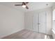 Bedroom featuring neutral carpet, a double door closet, and a window at 2208 Seneca Dr, Raleigh, NC 27604