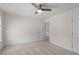 Bedroom with neutral carpet, ceiling fan, and white walls at 2208 Seneca Dr, Raleigh, NC 27604
