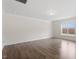 Bright, open-concept living area with hardwood flooring, neutral walls, and trim at 2208 Seneca Dr, Raleigh, NC 27604