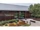 The Farmhouse community center features a welcoming entrance and landscaped grounds at 224 Daniel Ridge Rd, Wendell, NC 27591