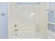 Clean bathroom featuring a tiled shower and tub, and a toilet at 2324 Stevens Rd, Raleigh, NC 27610