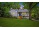 Charming single-story home with a well-manicured lawn and inviting front porch at 2324 Stevens Rd, Raleigh, NC 27610
