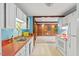 Traditional kitchen featuring a double sink, ample cabinet space, and appliances at 2324 Stevens Rd, Raleigh, NC 27610