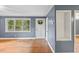 Cozy living room with hardwood floors, natural light, and built-in shelving at 2324 Stevens Rd, Raleigh, NC 27610