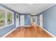 Spacious living room with hardwood floors, freshly painted walls, and natural light at 2324 Stevens Rd, Raleigh, NC 27610
