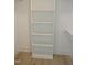 Walk-in closet featuring custom shelving and storage space at 2577 Silas Peak Ln, Apex, NC 27523