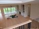Large living room with fireplace, built-ins, and access to the screened-in back porch at 2577 Silas Peak Ln, Apex, NC 27523