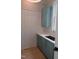 The pantry features shaker cabinets, a stainless sink, and a bright window at 2577 Silas Peak Ln, Apex, NC 27523