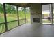 Relaxing screened porch with brick fireplace at 2577 Silas Peak Ln, Apex, NC 27523