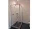Shower features a glass door, chrome hardware, and white subway tile surround at 2577 Silas Peak Ln, Apex, NC 27523