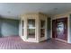 Charming front porch with wooden decking and a view of the neighborhood at 2617 Charenson Pl, Raleigh, NC 27614