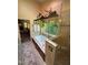 Beautiful bathroom featuring a soaking tub, separate shower, and view of outside greenery at 2645 Ridgewell Ct, Raleigh, NC 27613