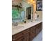 Bathroom featuring double sinks, vanity, and a large mirror, creating a functional and elegant space at 2645 Ridgewell Ct, Raleigh, NC 27613