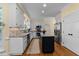 Updated kitchen with a center island, granite countertops, stainless steel appliances, and ample cabinet space at 2645 Ridgewell Ct, Raleigh, NC 27613