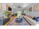 Spacious living room with fireplace, hardwood floors, and ample seating, perfect for entertaining and relaxation at 2645 Ridgewell Ct, Raleigh, NC 27613