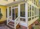 Bright sunroom with many windows, providing an abundance of natural light and peaceful views at 2645 Ridgewell Ct, Raleigh, NC 27613