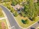 Aerial shot of a landscaped property on a cul-de-sac, surrounded by mature trees in a suburban neighborhood at 268 The Preserve Trl, Chapel Hill, NC 27517