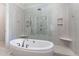 Contemporary bathroom with a soaking tub, tiled shower, and modern fixtures at 268 The Preserve Trl, Chapel Hill, NC 27517