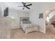 Neutral bedroom featuring a decorative wood frame, ample lighting, and a calming ambiance at 268 The Preserve Trl, Chapel Hill, NC 27517
