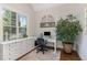 Bright home office with custom built-ins, large window, and hardwood floors at 268 The Preserve Trl, Chapel Hill, NC 27517