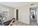 Bedroom featuring carpet floors, natural light, closet and access to the hallway at 2704 Atlantic St, Durham, NC 27707