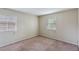 Clean and bright bedroom with carpet and natural light at 2704 Atlantic St, Durham, NC 27707