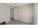 Bedroom featuring carpet floors, natural light, and closet at 2704 Atlantic St, Durham, NC 27707