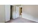 Well-lit bedroom with closet space and convenient access to an adjacent bathroom at 2704 Atlantic St, Durham, NC 27707