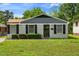 Charming single-story home with a well-maintained lawn and tidy front shrubbery at 2704 Atlantic St, Durham, NC 27707