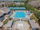 Aerial view of community pool with slide and tennis courts at 3413 Fairstone Rd, Wake Forest, NC 27587
